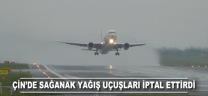 Çin'de sağanak yağış uçuşları iptal ettirdi